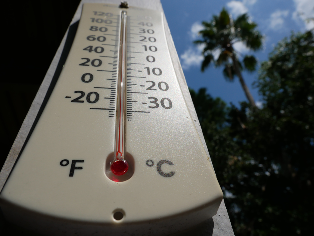 Outdoor Thermometer Showing Hot Weather in Austin, TX when emergency AC repair services may be required